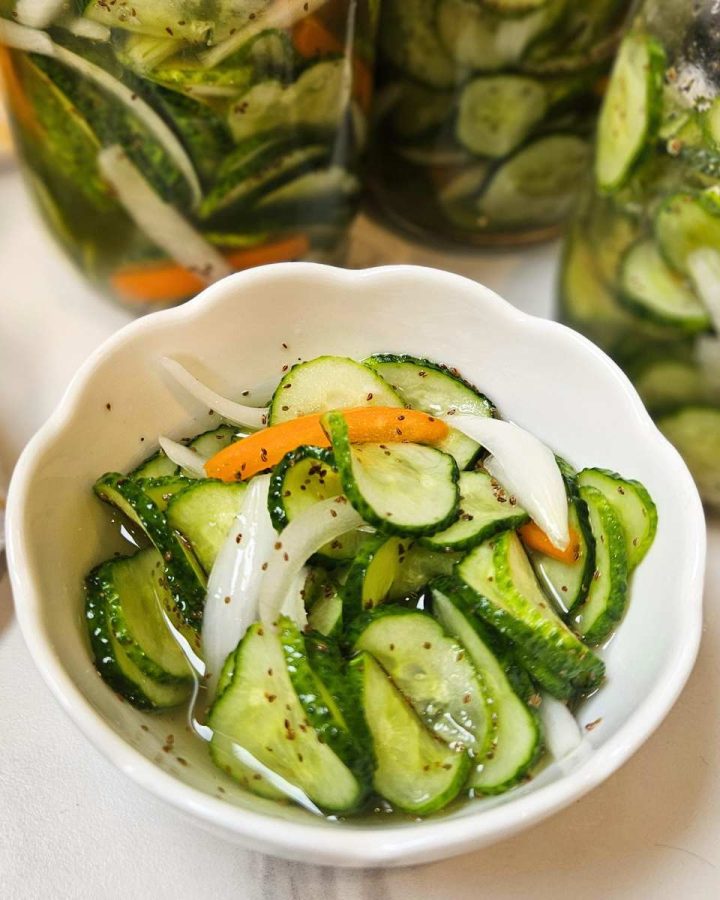 old fashioned sweet refrigerator pickles in a white bowl